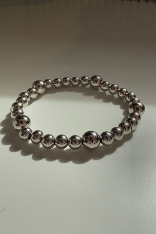 Silver 6x8mm Patterned Ball Bracelet